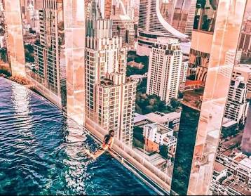 Rooftop infinity pool overlooking Bangkok skyscrapers